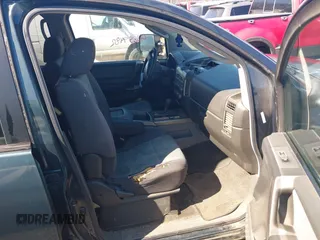 2005 Nissan Titan XE with VIN 1N6AA07A65N512479, listed as a IAAI auction lot 41659482 with 225,037 mi miles and . Bid and sale history available at DreamBid. Image 5.