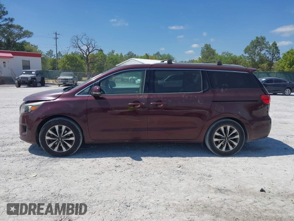 2015 Kia Sedona EX with VIN KNDMC5C19F6018139, listed as a IAAI auction lot 42031165 with 136,484 mi miles. Bid and sale history available at carsss.com. Image 14.