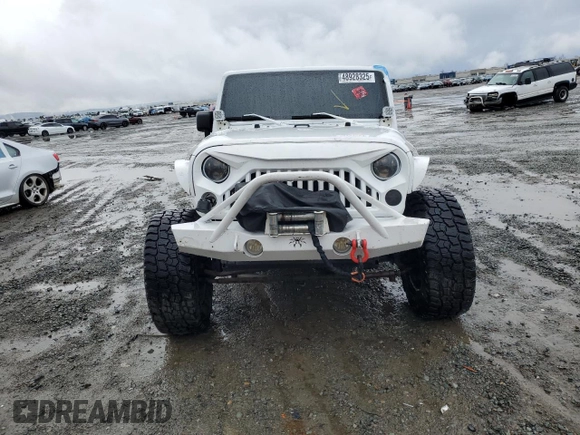 2013 Jeep Wrangler Sahara z VIN 1C4AJWBG7DL512437, wystawiony jako Copart lot #48928325 z przebiegiem Nie podano mil oraz Szkoda całkowita • Salvage title. Historia ofert i sprzedaży dostępna na DreamBid. Obrazek 5.