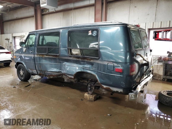 1995 Chevrolet Chevy Van z VIN 1GBEG25K2SF243949, wystawiony jako Copart lot #50422305 z przebiegiem 193 169 mil mil oraz Szkody całkowita. Historia ofert i sprzedaży dostępna na DreamBid. Obrazek 2.