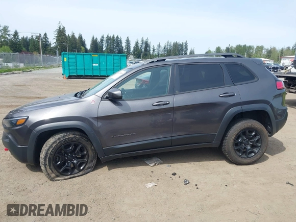 2019 Jeep Cherokee Trailhawk with VIN 1C4PJMBX2KD231734, listed as a IAAI auction lot 42235469 with 104,565 mi miles and . Bid and sale history available at DreamBid. Image 14.