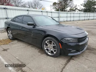 2015 Dodge Charger SXT with VIN 2C3CDXJG3FH919988, listed as a Copart auction lot 49340374 with 99,200 mi miles and Salvage title. Bid and sale history available at DreamBid. Image 4.