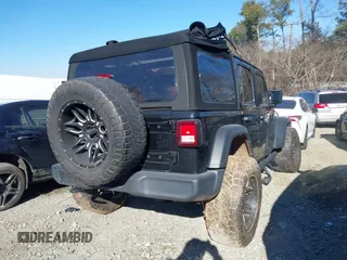 2022 Jeep Wrangler Unlimited Sport with VIN 1C4HJXDNXNW112324, listed as a IAAI auction lot 41376149 with 69,435 mi miles and . Bid and sale history available at DreamBid. Image 4.