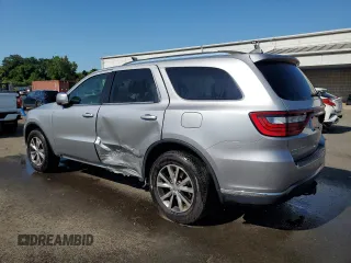 2016 Dodge Durango Limited with VIN 1C4RDJDG2GC467518, listed as a Copart auction lot 64570305 with 117,593 mi miles and Salvage title. Bid and sale history available at DreamBid. Image 2.