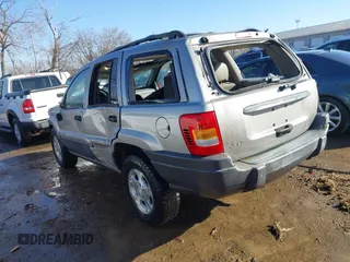 2001 Jeep Grand Cherokee Laredo with VIN 1J4GX48S51C735316, listed as a IAAI auction lot 41752349 with 214,101 mi miles and . Bid and sale history available at DreamBid. Image 3.