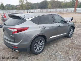 2023 Acura RDX w/Technology Package with VIN 5J8TC1H59PL004665, listed as a IAAI auction lot 40735574 with 14,242 mi miles. Bid and sale history available at carsss.com. Image 4.