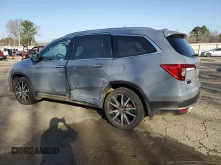 2022 Honda Pilot Touring 7-Passenger with VIN 5FNYF5H69NB031537, listed as a Copart auction lot 48986685 with 88,301 mi miles and Salvage title. Bid and sale history available at DreamBid. Image 2.