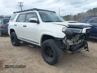 2014 Toyota 4Runner Limited with VIN JTEBU5JR5E5167175, listed as a IAAI auction lot 41662572 with 168,706 mi miles. Bid and sale history available at carsss.com. Image 1.