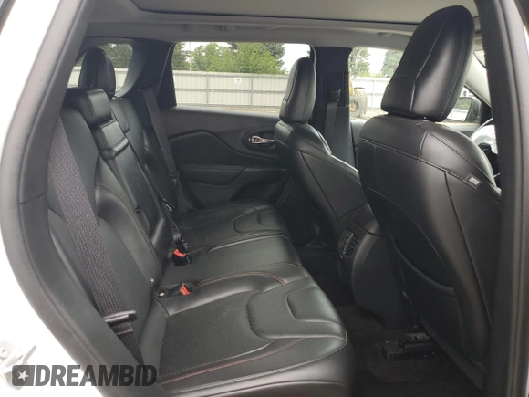2019 Jeep Cherokee Trailhawk Elite with VIN 1C4PJMBX7KD140720, listed as a Copart auction lot 64268064 with 61,747 mi miles and Salvage Title. Bid and sale history available at carsss.com. Image 10.