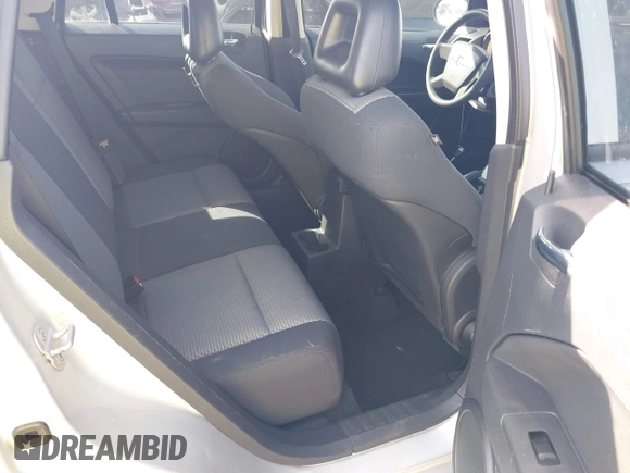 2009 Dodge Caliber SXT with VIN 1B3HB48A39D142674, listed as a IAAI auction lot 41642867 with 156,504 mi miles and . Bid and sale history available at carsss.com. Image 8.