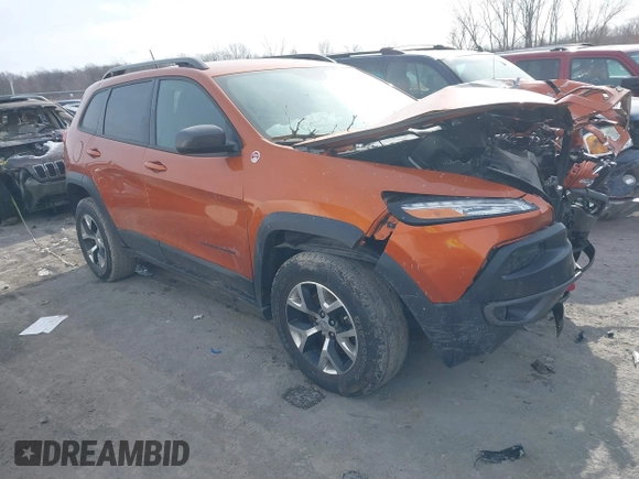 2015 Jeep Cherokee Trailhawk with VIN 1C4PJMBB3FW642266, listed as a IAAI auction lot 41510571 with 72,030 mi miles and . Bid and sale history available at DreamBid. Image 1.