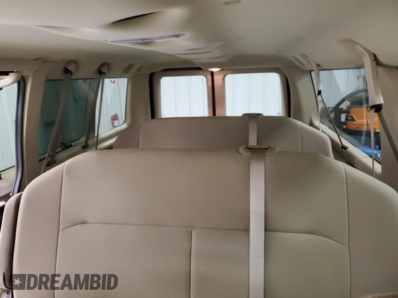 2008 Ford Econoline Passenger XL with VIN 1FMNE11L38DA52308, listed as a Copart auction lot 50180065 with 187,079 mi miles and Salvage title. Bid and sale history available at DreamBid. Image 10.