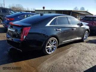 2015 Cadillac XTS Luxury with VIN 2G61N5S30F9230083, listed as a Copart auction lot 84860774 with 138,312 mi miles and Salvage Title. Bid and sale history available at carsss.com. Image 3.