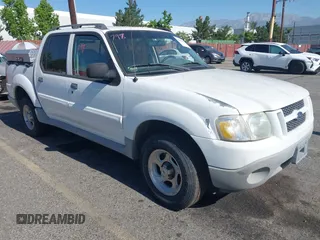 2003 Ford Explorer Sport Trac XLS z VIN 1FMZU67E93UC13618, wystawiony jako IAAI lot #42301432 z przebiegiem 80 064 mil mil oraz . Historia ofert i sprzedaży dostępna na DreamBid. Obrazek 1.