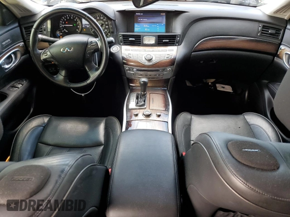 2015 Infiniti Q70 with VIN JN1EY1AP9FM510013, listed as a Copart auction lot 45341105 with 92,255 mi miles and Salvage title. Bid and sale history available at DreamBid. Image 8.