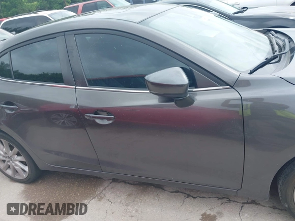 2017 Mazda 3 Touring with VIN 3MZBN1V74HM121397, listed as a IAAI auction lot 42143495 with 194,122 mi miles and . Bid and sale history available at DreamBid. Image 13.