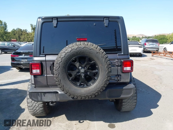 2021 Jeep Wrangler Unlimited Willys с VIN 1C4HJXDG7MW576798, выставлен на аукционе IAAI как лот 42471651 с пробегом 58 481 миль миль и . История ставок и продаж доступна на DreamBid. Изображение 16.
