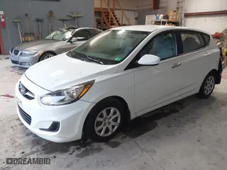 2013 Hyundai Accent GL with VIN KMHCT5AE6DU122559, listed as a IAAI auction lot 41800714 with 129,582 mi miles. Bid and sale history available at carsss.com. Image 17.
