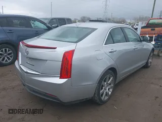 2014 Cadillac ATS Standard RWD z VIN 1G6AA5RA1E0177452, wystawiony jako IAAI lot #39138915 z przebiegiem 134 473 mil mil oraz . Historia ofert i sprzedaży dostępna na DreamBid. Obrazek 4.