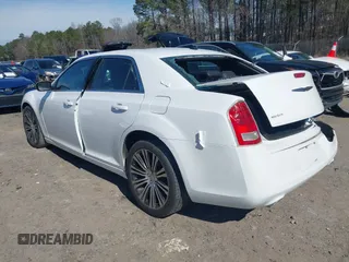2013 Chrysler 300 with VIN 2C3CCABGXDH699096, listed as a IAAI auction lot 41614034 with 136,344 mi miles. Bid and sale history available at carsss.com. Image 3.