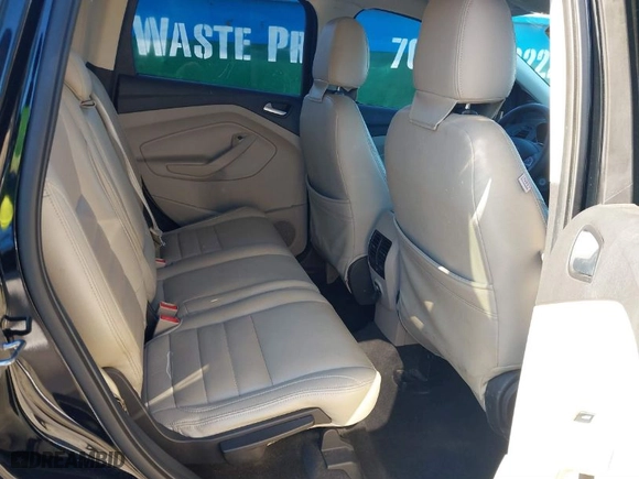 2017 Ford Escape SE with VIN 1FMCU0GD7HUC59045, listed as a IAAI auction lot 41304143 with 125,809 mi miles. Bid and sale history available at carsss.com. Image 8.