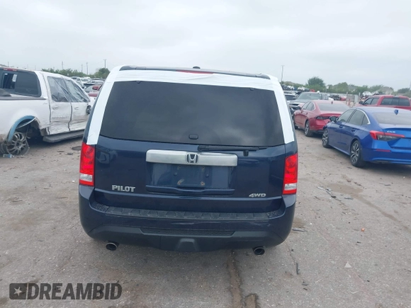2012 Honda Pilot EX-L with VIN 5FNYF4H52CB070811, listed as a IAAI auction lot 41938672 with 156,446 mi miles and . Bid and sale history available at DreamBid. Image 16.