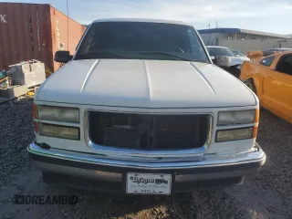 1999 GMC Yukon with VIN 1GKEC13R6XJ808715, listed as a Copart auction lot 83407094 with 340,933 mi miles and Salvage Title. Bid and sale history available at carsss.com. Image 5.