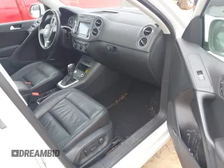 2016 Volkswagen Tiguan S with VIN WVGBV7AXXGW585445, listed as a IAAI auction lot 42083377 with 111,011 mi miles and . Bid and sale history available at DreamBid. Image 5.