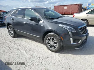 2023 Cadillac XT5 AWD Premium Luxury with VIN 1GYKNDR4XPZ153623, listed as a Copart auction lot 77071324 with 26,292 mi miles and Non Repairable. Bid and sale history available at DreamBid. Image 4.