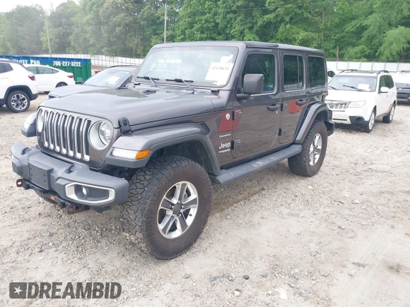 2018 Jeep Wrangler Unlimited Sahara with VIN 1C4HJXEN8JW303023, listed as a IAAI auction lot 42138631 with 72,463 mi miles and . Bid and sale history available at DreamBid. Image 2.