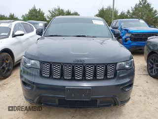 2018 Jeep Grand Cherokee Laredo with VIN 1C4RJFAG4JC303222, listed as a IAAI auction lot 42276244 with 83,585 mi miles and . Bid and sale history available at DreamBid. Image 12.