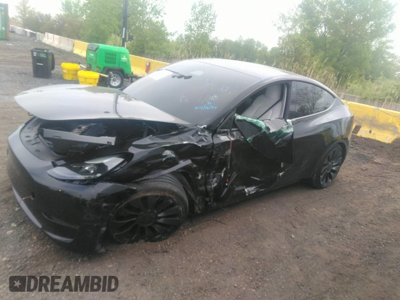2022 Tesla Model Y Performance with VIN 7SAYGDEF6NF530388, listed as a IAAI auction lot 39253462 with 21,393 mi miles and . Bid and sale history available at DreamBid. Image 13.