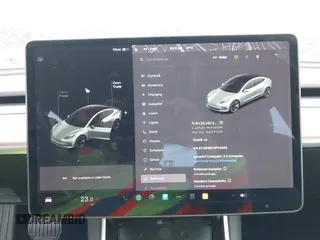 2018 Tesla Model 3 Long Range Battery with VIN 5YJ3E1EB7JF114305, listed as a IAAI auction lot 41765994 with 76,945 mi miles and . Bid and sale history available at DreamBid. Image 19.
