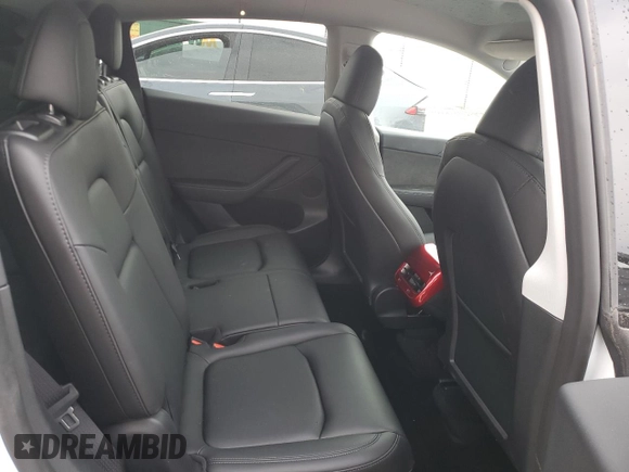 2024 Tesla Model Y Long Range with VIN 7SAYGAEE1RF061318, listed as a Copart auction lot 81142444 with 3,249 mi miles and Salvage Title. Bid and sale history available at DreamBid. Image 10.