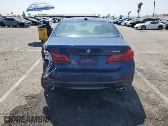 2018 BMW 5 Series 540i with VIN WBAJE5C51JWA94673, listed as a Copart auction lot 59807825 with 77,051 mi miles and Salvage title. Bid and sale history available at DreamBid. Image 6.