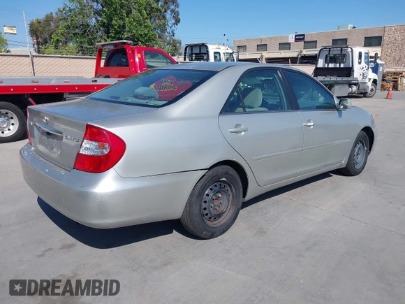 2004 Toyota Camry LE with VIN 4T1BE32K94U832506, listed as a IAAI auction lot 42152776 with 186,627 mi miles and . Bid and sale history available at carsss.com. Image 4.
