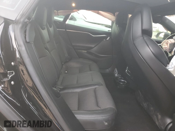 2017 Tesla Model S 60 z VIN 5YJSA1E15HF218686, wystawiony jako Copart lot #44689465 z przebiegiem 101 964 mil mil oraz Szkoda całkowita • Salvage title. Historia ofert i sprzedaży dostępna na DreamBid. Obrazek 11.