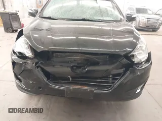 2013 Hyundai Tucson GLS with VIN KM8JU3AC8DU557445, listed as a IAAI auction lot 41839782 with 153,769 mi miles. Bid and sale history available at carsss.com. Image 6.