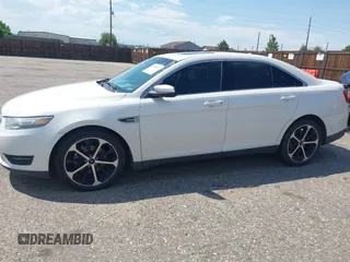 2015 Ford Taurus SEL with VIN 1FAHP2H8XFG203309, listed as a IAAI auction lot 42598215 with 163,190 mi miles and . Bid and sale history available at DreamBid. Image 14.