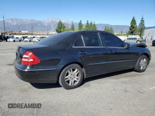 2003 Mercedes-Benz E-Class 3.2L with VIN WDBUF65J23A108105, listed as a Copart auction lot 79939884 with 238,172 mi miles and Salvage Title. Bid and sale history available at carsss.com. Image 3.