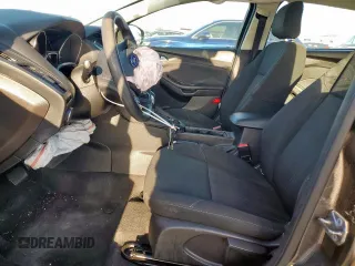 2018 Ford Focus SE z VIN 1FADP3F2XJL256272, wystawiony jako Copart lot #52651675 z przebiegiem 37 897 mil mil oraz Szkody całkowita. Historia ofert i sprzedaży dostępna na DreamBid. Obrazek 7.