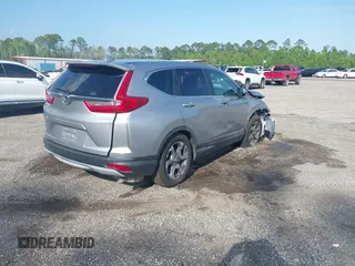 2017 Honda CR-V EX with VIN 7FARW1H57HE044719, listed as a IAAI auction lot 41028583 with 109,885 mi miles. Bid and sale history available at carsss.com. Image 4.