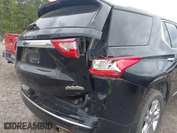 2020 Chevrolet Traverse High Country with VIN 1GNERNKW3LJ186049, listed as a IAAI auction lot 42010235 with 125,847 mi miles and . Bid and sale history available at DreamBid. Image 6.