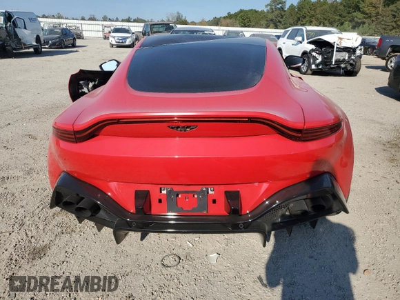 2020 Aston Martin Vantage z VIN SCFSMGAWXLGN03122, wystawiony jako Copart lot #77734374 z przebiegiem Nie podano mil oraz Szkoda całkowita • Salvage title. Historia ofert i sprzedaży dostępna na DreamBid. Obrazek 6.