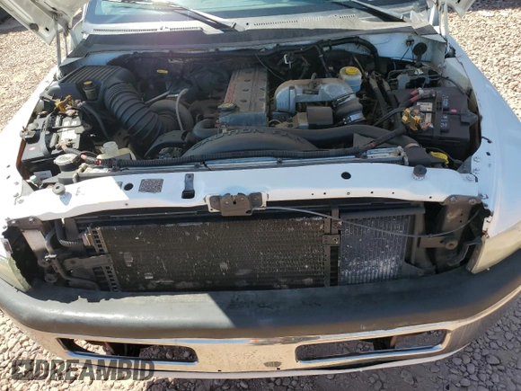 1999 Dodge 2500 with VIN 1B7KF2368XJ503590, listed as a Copart auction lot 57473105 with 401,040 mi miles and Clean title. Bid and sale history available at DreamBid. Image 11.