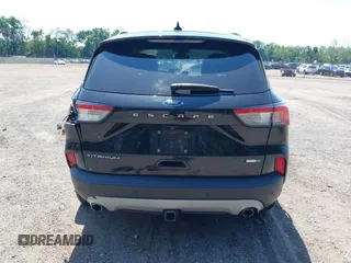 2020 Ford Escape Titanium with VIN 1FMCU9J92LUA27373, listed as a IAAI auction lot 42650077 with 42,179 mi miles and . Bid and sale history available at DreamBid. Image 17.