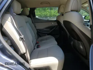 2017 Hyundai Santa Fe 2.4L z VIN 5NMZUDLB7HH028678, wystawiony jako Copart lot #57557855 z przebiegiem 102 049 mil mil oraz Szkoda całkowita • Salvage title. Historia ofert i sprzedaży dostępna na DreamBid. Obrazek 11.