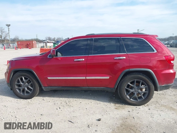 2011 Jeep Grand Cherokee Laredo with VIN 1J4RR4GG6BC527897, listed as a IAAI auction lot 42032975 with 148,875 mi miles. Bid and sale history available at carsss.com. Image 15.