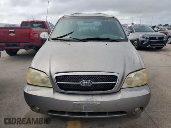 2004 Kia Sedona LX with VIN KNDUP131446570061, listed as a Copart auction lot 74222344 with 0 mi miles and Salvage Title. Bid and sale history available at carsss.com. Image 5.
