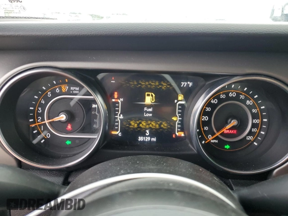 2021 Jeep Wrangler Sport with VIN 1C4GJXAG0MW571359, listed as a Copart auction lot 75189354 with 35,129 mi miles and Non Repairable. Bid and sale history available at DreamBid. Image 9.